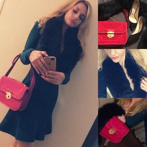 Alexandar McQueen pink velvet bag